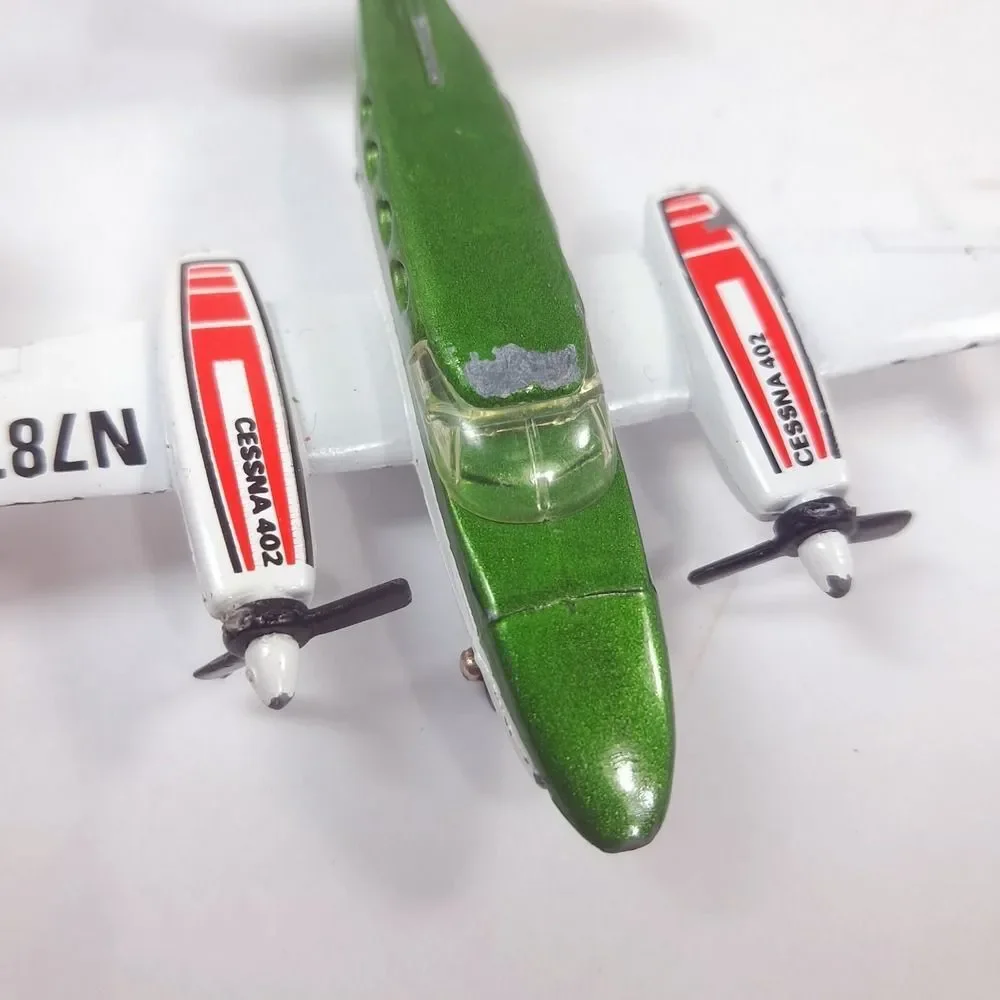 MATCHBOX Sky Busters 1974 SP9 Cessna 402 plane Airplane Macau Diecast green